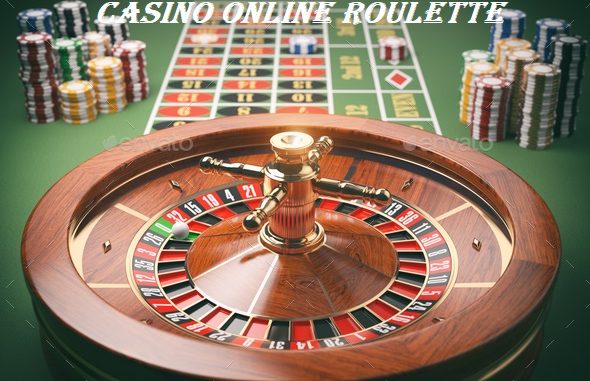 Casino roulette wheel with casino chips on green table. Gambling